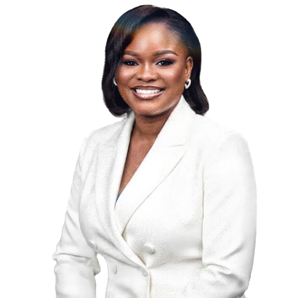 Professional portrait of smiling woman in white blazer on black background.