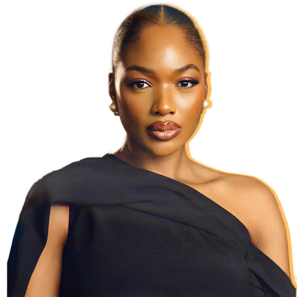 Elegant studio portrait of Onyeka Michael-Ugwu in a dark one-shoulder dress.