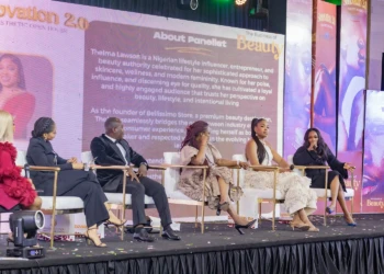 Beauty panel discussion on stage at The Business of Beauty summit with influencers and entrepreneurs. Beauty panel discussion stage with speakers at The Business of Beauty summit.